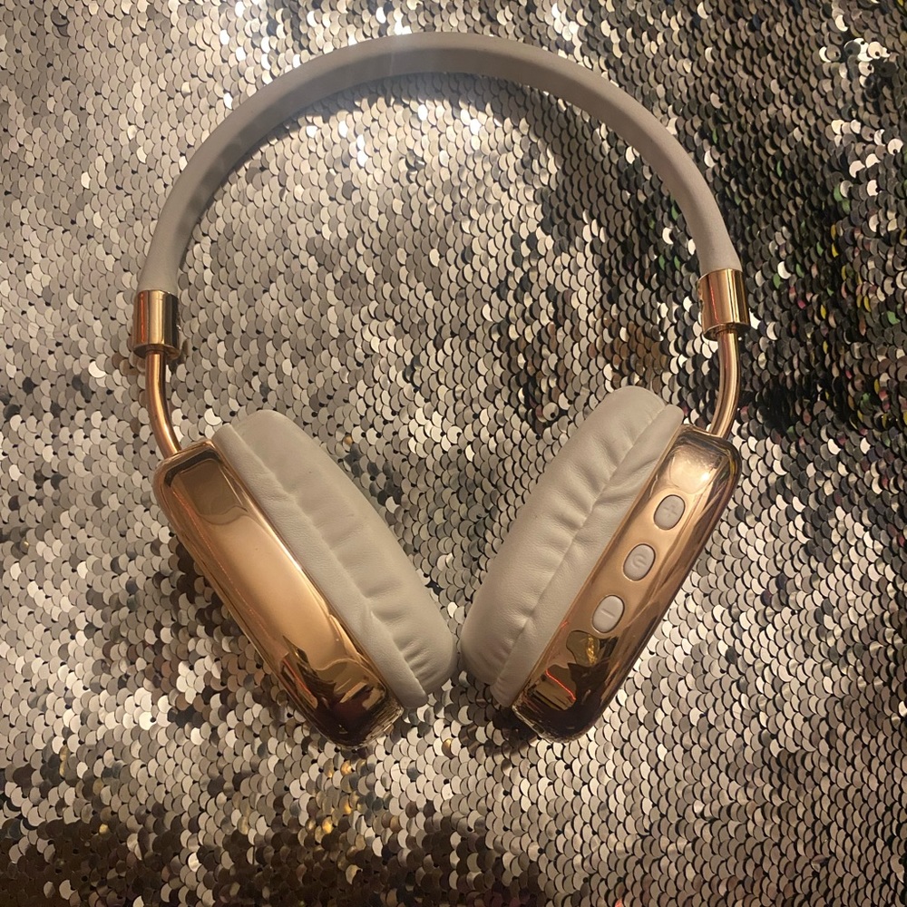 Brand: ELLE, Bluetooth head phones, comes with charger, in good condition